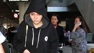 LilyRose Depp Pulls Her Hood Up At LAX [upl. by Dnomaj155]