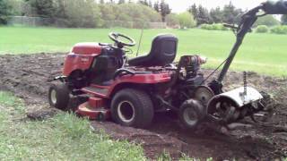 Scabbin A Rototiller On The Garden Tractor [upl. by Bilicki]