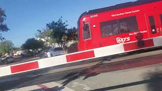 E Park Ave railroad crossing passing trolley blue line metro area [upl. by Ennaerb]