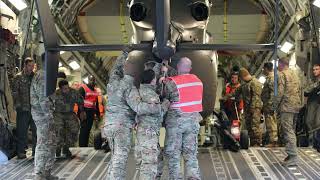 AKNG Soldiers and Airmen load UH72A Helicopters onto C17 for Southwest Border Mission BRoll [upl. by Sairahcaz]