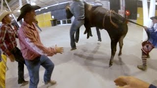 Angry bull escapes into crowd and drags rodeo bullfighters [upl. by Broeker]