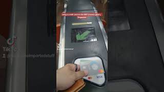 Using a credit card to get on the MRT metro in Singapore [upl. by Assetniuq]