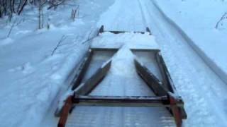 Grooming the skidoo trail with homemade drag [upl. by Tarsuss]