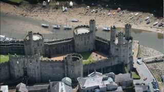 Caernarfon Castle Wales  Visit Britain  Unravel Travel TV [upl. by Htidirrem]