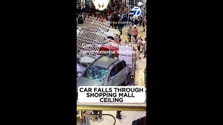 Car falls through shopping center [upl. by Akemeuwkuhc136]