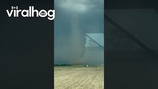 Close Encounter With a Landspout Tornado  ViralHog [upl. by Aramak]