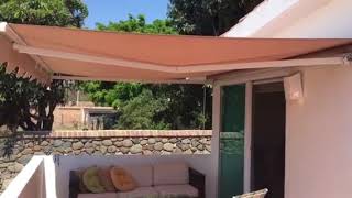 Toldo Retractil Automatico [upl. by Latsyrc]