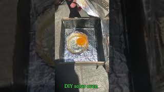 cooking an egg in solar oven [upl. by Ydnas]