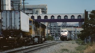 Amtraks California Zephyr 5 passes UP trailer train at street level in Reno NV [upl. by Jessey]