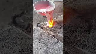 The process of pouring molten iron into the mold [upl. by Ellak]