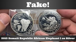 Fake 2015 Somali Republic African Elephant 1 oz Silver  Close Look at Counterfeit Coin [upl. by Retsehc]