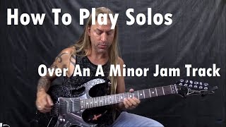 How to Play Solos Over An A Minor Jam Track  GuitarZoomcom  Steve Stine [upl. by Murvyn466]