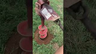 Digging fence post holes with kubota L3301 tractor [upl. by Tellford]