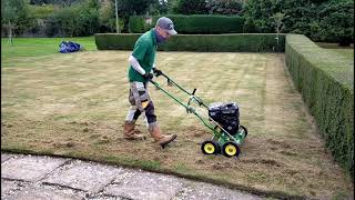 BRUTAL Lawn Scarifying  Dethatching FIXING An UGLY LAWN [upl. by Anikas160]