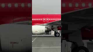 Red Aircraft taxing Airbus320 dehliairport aviation passengeraircraft trending planespotting [upl. by Eibloc]