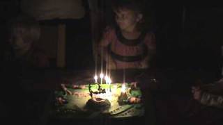 Blowing out 4th birthday candles [upl. by Kipper]