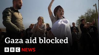 Israeli protesters block food convoys for starving civilians in Gaza  BBC News [upl. by Pentheam]