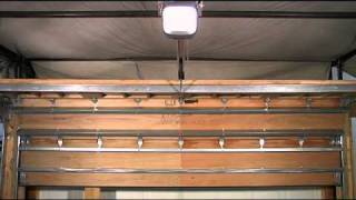 Genie garage door opener lifts heavy windload rated door [upl. by Al]