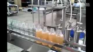 200ML bottle filling capping and labeling machine automatic 4 nozzles liquid filling line [upl. by Cochrane]