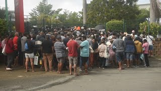 People queue outside supermarket in New Caledonias Noumea  AFP [upl. by Longerich]