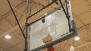 High school basketball player shatters backboard with monster slam [upl. by Helsell879]