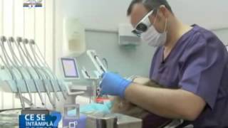 Clinica stomatologica Dentland Albire dentara Impl [upl. by Brownson365]