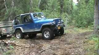 Jeep Wrangler YJ Detroit Locker Truetrac lockers Warn 8000 pulling trailer load of firewood [upl. by Irrol]