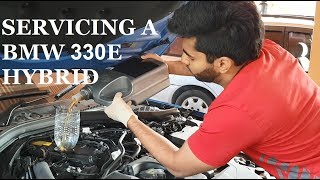 BMW OIL amp FILTER CHANGE ON A BMW 330E HYBRID [upl. by Rist333]