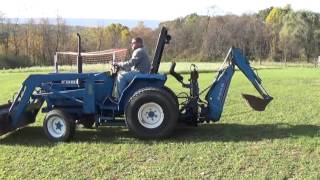 NEW HOLLAND 1720 4X4 TRACTOR WITH LOADER AND BACKHOE [upl. by Helsie]