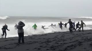 Waves Sneak Up Reynisfjara Beach in Iceland and Knock Over Tourists [upl. by Dulcinea]