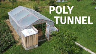 A Tour Through Our Permaculture Polytunnel [upl. by Aiekal]