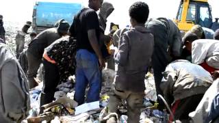 Poor Ethiopian Children Eating From Garbage Truck in Addias Ababa [upl. by Stalder461]