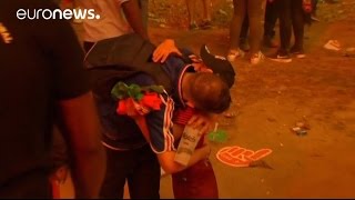 Euro 2016 Young Portugal supporter consoles tearyeyed French fan [upl. by Milena]