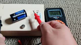 check battery voltages on some oldsmall lr44 batteries Using Tacklife DM02A voltage multimeter [upl. by Eanwahs136]