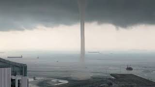 Massive waterspout looms off Singapore coast [upl. by Reinaldos189]