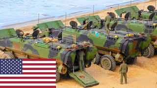 US Marine Amphibious Combat Vehicles ACVs drive into the sea during an exercise [upl. by Ratha]