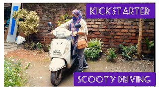 Women driving scooty  Women kickstarting scooty [upl. by Haberman]