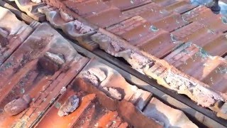 Leaking tile roofing repair  leaking ridge capping on a terracotta tile roof [upl. by Treblah]