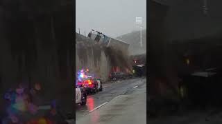 Frightening 18Wheeler Falls From Highway Overpass Onto Car Crash Below [upl. by Auqined]