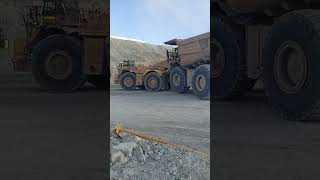 Towing a Cat 797F dump truck dumptruck towing [upl. by Averil]