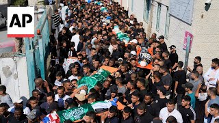 Funerals held for 18 Palestinians killed by Israeli strike in West Bank [upl. by Quill]