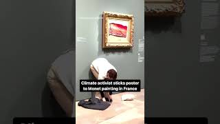 Climate activist sticks poster to Monet painting in France [upl. by Wilkey302]