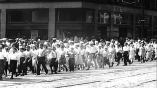 Junior birdmen salute Jimmy Doolittle at a parade in Buffalo New York HD Stock Footage [upl. by Elleral78]