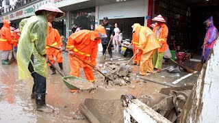 Draining Flooded Roads During Downpours Unclogging Drains to Stop Floods [upl. by Ynetsed830]