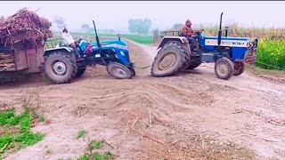 OMFO Donon tractor farrate Kaat Rahi hai Swaraj pulling trolley ganne se a full load dollar [upl. by Megen566]