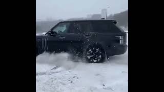 A Range Rover SVO does some crazy donuts in the snow [upl. by Nickerson]