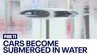 California rain Long Beach cars submerged in flood waters [upl. by Anairol]