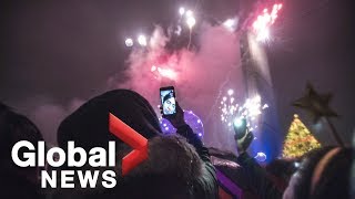 Toronto rings in the New Year with a spectacular fireworks display [upl. by Asilat]