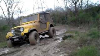 1983 cj7 jeep mudding [upl. by Nylear]