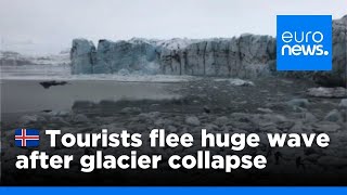 Watch Tourists flee large wave after Icelandic glacier collapse  euronews 🇬🇧 [upl. by Pilihp]